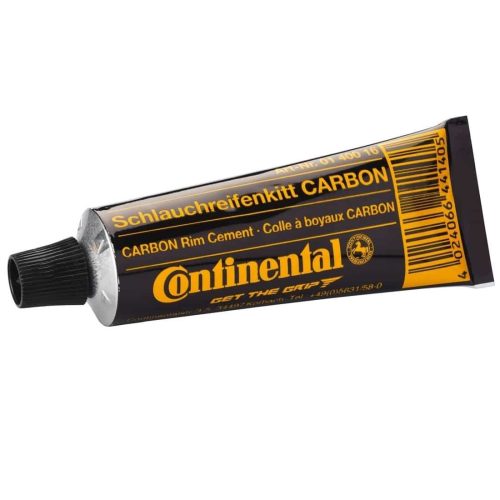 En tub Continental kolfiberfälgcement med svartgul etikett