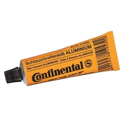 En gul tub märkt "Continental Schlauchreifenkit ALUMINIUM" med svart lock