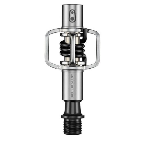 En silverfärgad och svart Crankbrothers-cykelpedal med en minimalistisk spindeldesign med två fjäderbelastade hållare och en cylindrisk axel.