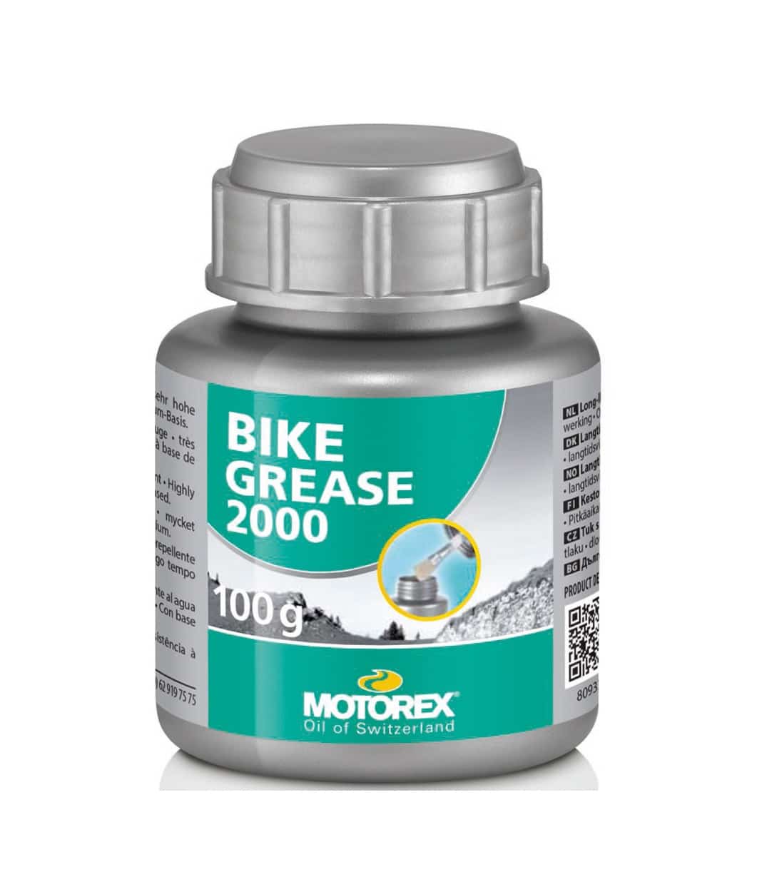 Motoerex-Bike-greas-2000.jpg En silverfärgad och grå flaska märkt "Bike Grease 2000" från Motorex rymmer 100 gram produkt. Etiketten har blå och gröna färger, text på flera språk och en liten bild av fett som appliceras.