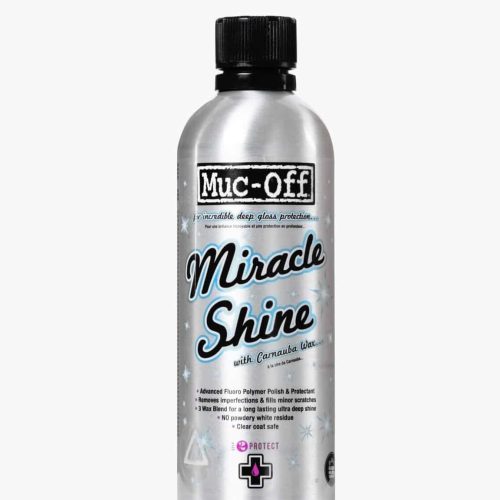 En silverfärgad flaska med Muc-Off Miracle Shine polish med svart skruvkork, blå och svart text och designelement på etiketten, stående upprätt mot en vit bakgrund.