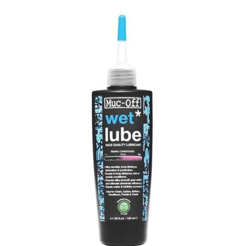 En flaska Muc-Off Wet Lube med en spetsig blå och vit applikatorspets, med en svart etikett med blå och vit text och grafik. Flaskan står upprätt mot en vit bakgrund.
