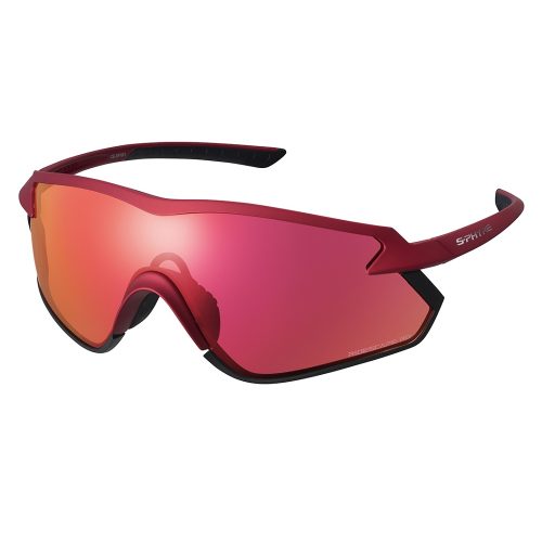 Röda sportsolglasögon med en enda stor, böjd spegellins som har en orange-rosa nyans. Bågen är slank med kantiga linjer och bågarna är svarta med "SPINSHIELD"-märket synligt på ena sidan.