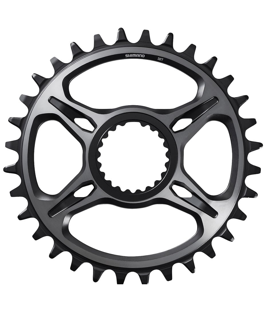 SM-CR-M95.jpg En svart Shimano-kedjekrans för cykel med en 34-tandad smalbred design och ett centralt monteringshål, mot en vit bakgrund.