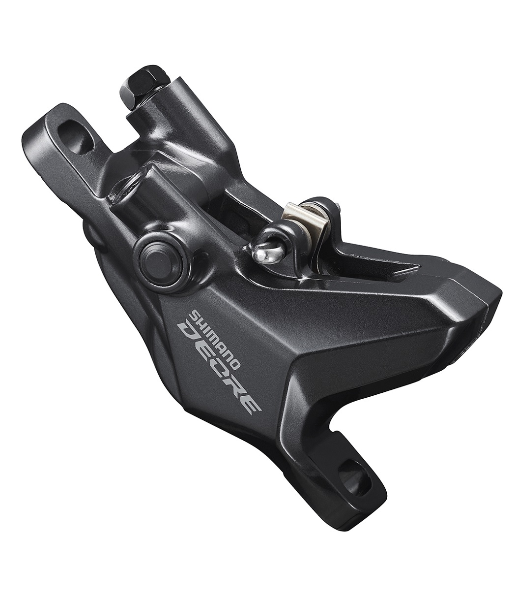 Shimano-Deore-BR-M6100MPRX.jpg Ett svart Shimano Deore XT hydrauliskt skivbromsok för cykel visas mot en vit bakgrund. Bromsoket har monteringshål och varumärkesmärkning på sidan.