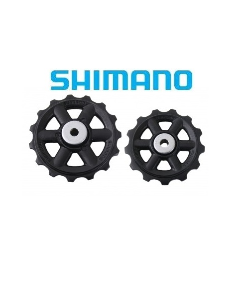 Shimano-Rulltrissor-2.png Två svarta Shimano-cykelväxelhjul, det ena större än det andra, visas sida vid sida på en vit bakgrund med den blå Shimano-logotypen ovanför dem.