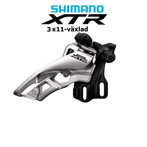En Shimano XTR framväxel för en cykel med 3x11 växlar, mot en vit bakgrund med texten "SHIMANO XTR 3x11-växlad" ovanför komponenten.