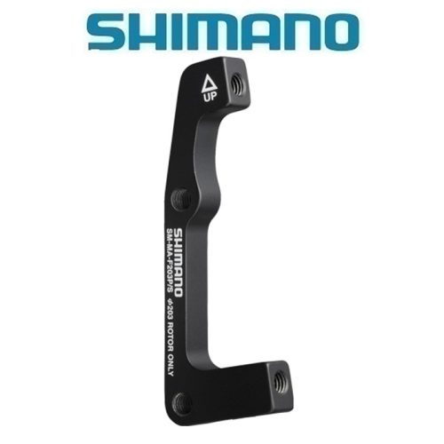 En svart Shimano-cykelbromsadapter med vit text och en pil märkt "UP", visad vertikalt mot en vit bakgrund med den blå Shimano-logotypen ovanför.