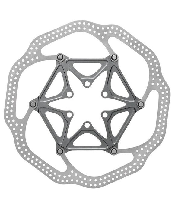 Sram-HSX140.jpg Närbild av en skivbromsrotor för cykel med en silverfärgad, vågformad ytterring och en geometrisk, sexarmad central monteringsstruktur. Rotorn har flera små hål för värmeavledning.