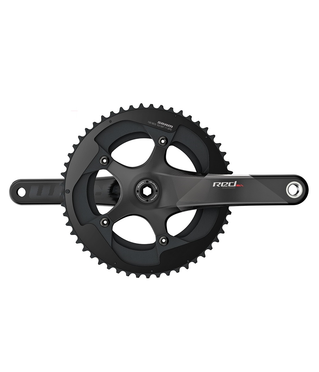 Sram-Red-BB30-vev.jpg Ett svart cykelvevställ med två kedjehjul, femarmad spindel och märkningen "RED" på höger vevarm, mot en vit bakgrund.