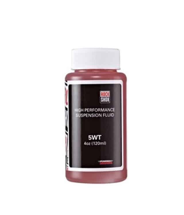 Suspension-oil-5-WT.jpg En 120 ml (4 oz) flaska märkt "RockShox High Performance Suspension Fluid 5WT" med svart och röd etikett och vitt lock, avsedd att användas i cykelns fjädringssystem.