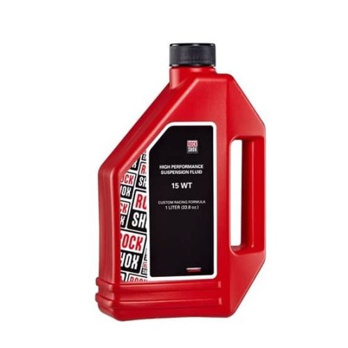 En röd 1-liters plastbehållare med RockShox High Performance Suspension Fluid 15 WT med svart lock och en svartvit etikett på framsidan.