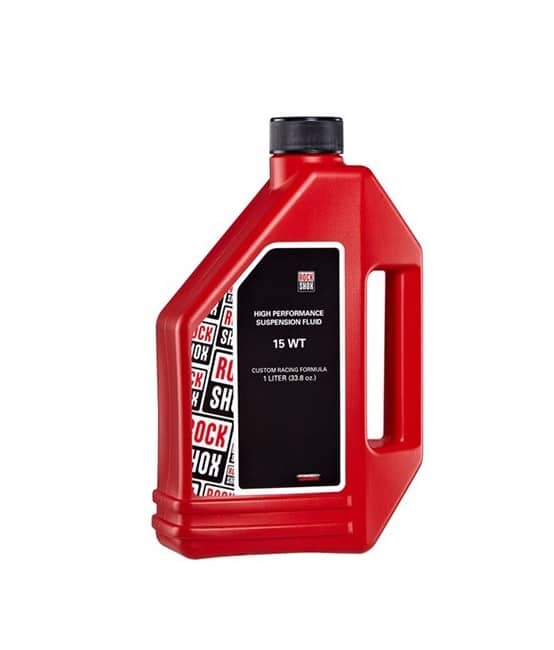 Suspension-oil15-WT-1litre.jpg En röd 1-liters plastbehållare med RockShox High Performance Suspension Fluid 15 WT med svart lock och en svartvit etikett på framsidan.