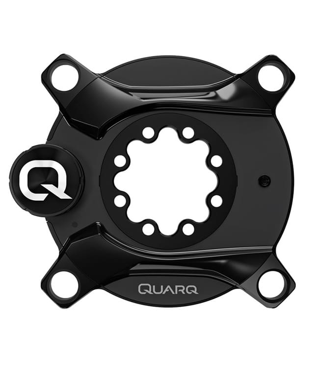 XX1-Eagle-DZero-AS-Dub-Powermeter-spindel.jpg En svart Quarq cykeleffektmätarspindel med fyra bulthål och ett centralt fästmönster för kedjehjul, sedd uppifrån, med Quarq-logotypen och ett runt lock på vänster sida.