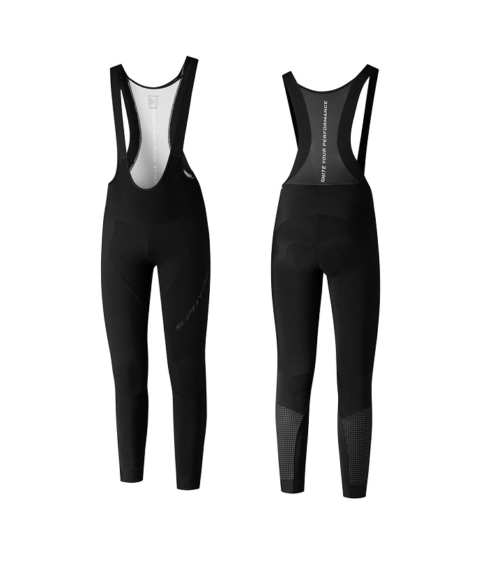 langbyxor-s-phyre.png Fram- och bakifrån på svarta cykeltights med axelremmar, bakstycken i mesh och förstärkta texturerade partier på nedre delen av benen. Vit varumärkestext är synlig på övre delen av ryggen.