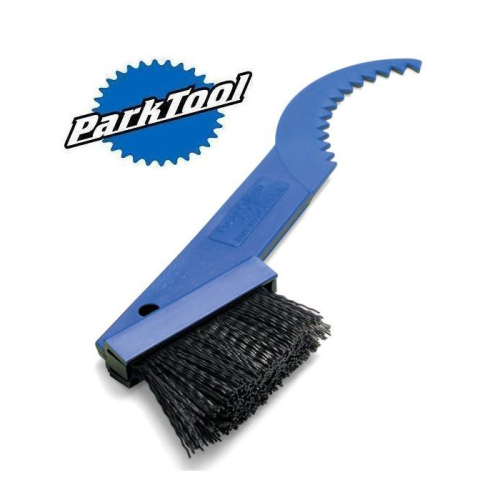 En blå Park Tool-cykelrengöringsborste med styva svarta borst och en krokig plastände för rengöring av växlar och kedjor. Park Tool-logotypen visas i det övre vänstra hörnet.