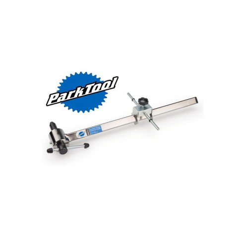 En uppriktningsmätare för cykelramar av märket Park Tool med en lång metallarm, justeringsrattar och mätmarkeringar, placerad på en vit bakgrund bredvid Park Tool-logotypen.