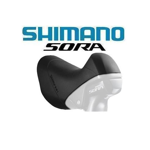 Shimano Sora cykelväxel med Shimano-logotypen i blått och Sora-logotypen i svart ovanför växeln mot en vit bakgrund.