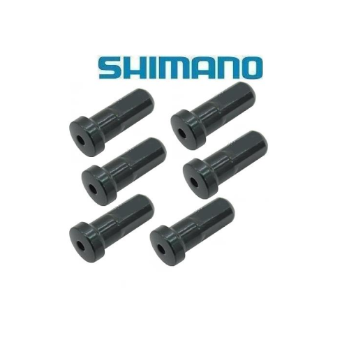 Sex svarta Shimano-kabeländstycken är placerade i två rader om tre mot en vit bakgrund