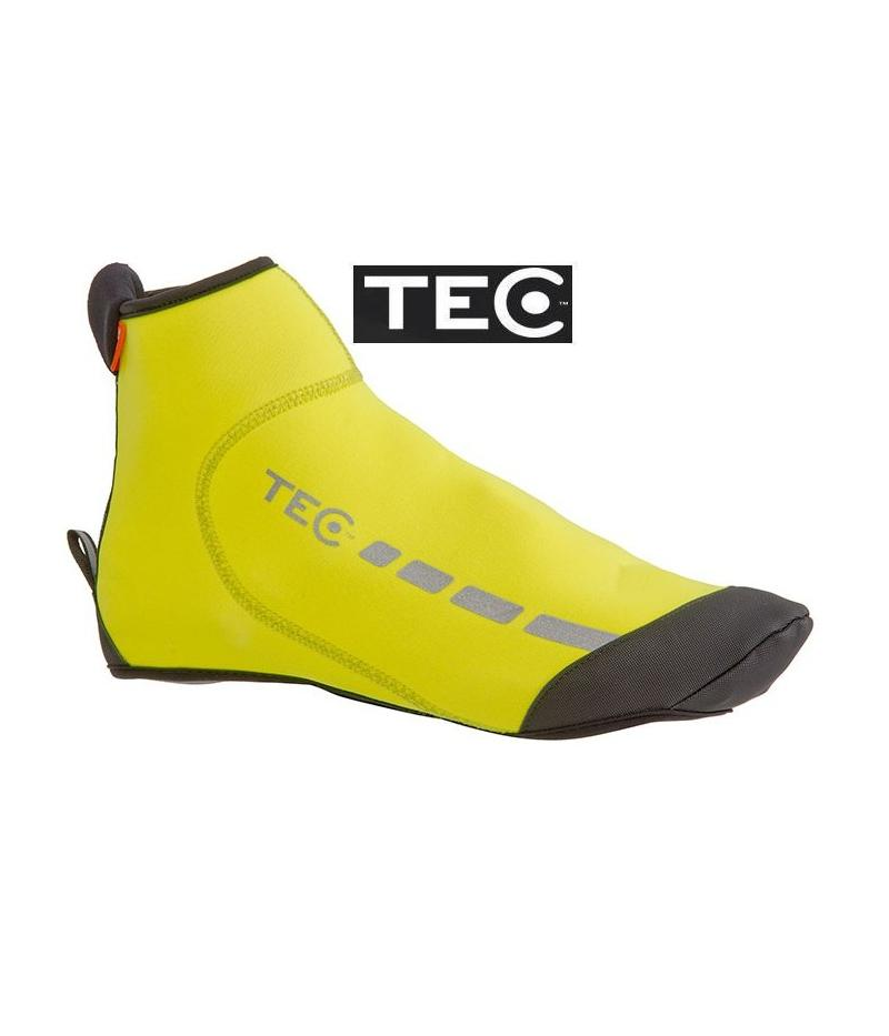 tec-skoskydd-gul.png Ett gult cykelskoöverdrag med TEC-märke med svarta förstärkningar på tå och häl, reflekterande detaljer och en liten dragflik vid hälen. TEC-logotypen visas ovanför skoöverdraget.