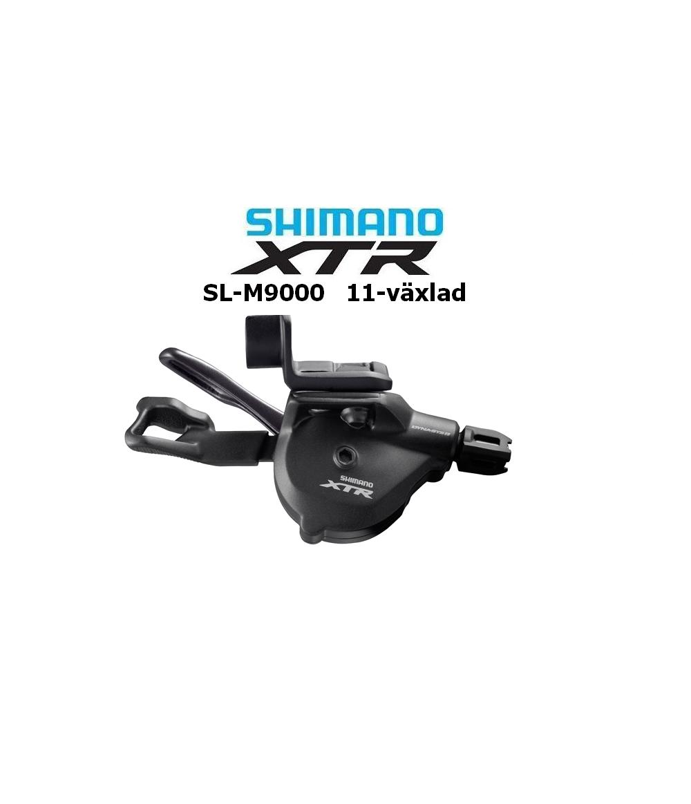 vaxelreglage-shimano-xtr-sl-m9000-i-spec-ii.png En Shimano XTR SL-M9000 11-växlad cykelväxel visas mot en vit bakgrund. Shimano XTR-logotypen och produktnamnet visas ovanför växelspaken i blå och svart text.