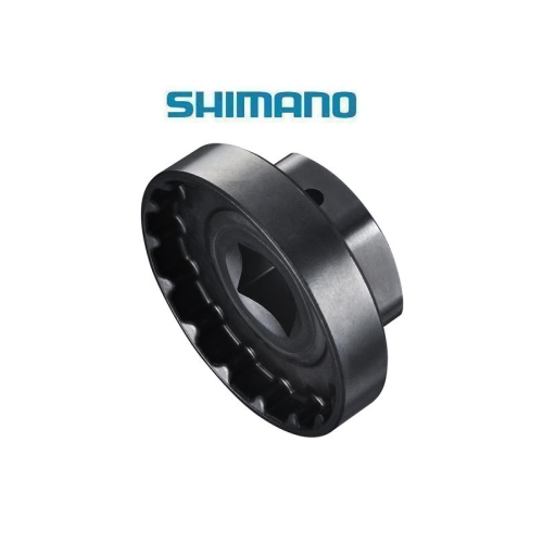 En svart Shimano cykelkomponentdel visas mot en vit bakgrund