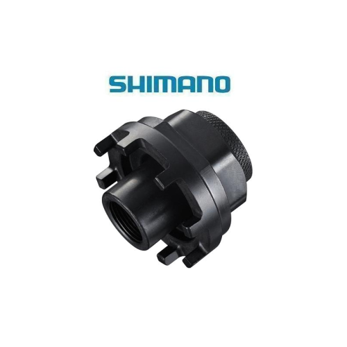 Ett svart Shimano-cykelverktyg med flera skåror och en gängad mitt visas mot en vit bakgrund. Den blå Shimano-logotypen visas ovanför verktyget.