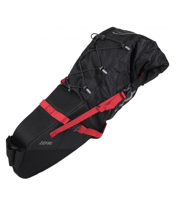 z-adventure-r17.jpg En svart Zefal bikepacking-sadelväska med röda remmar, justerbara bungee-snören på ovansidan och ett säkert spännsystem, utformad för att fästas på en cykelsadelstolpe och sadelskenor.