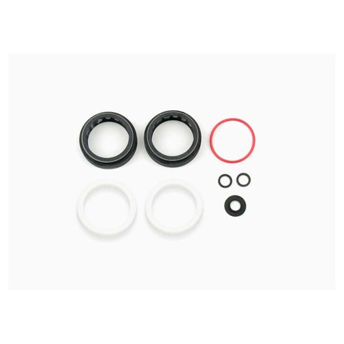 Servicekit RockShox Service kit XC32 Solo Air A3 har nio cirkulära tätningar och ringar i svart, vitt och rött, i olika storlekar och prydligt placerade på en vit bakgrund.