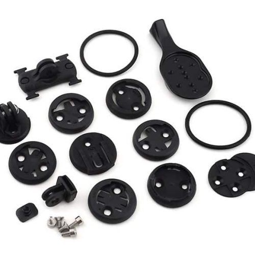 Närbild av Specialized Stem Accessory Mount-kit, som visar olika fästen, adaptrar, gummiringar och skruvar i svart, arrangerade på en ljus bakgrund, vilket framhäver detaljerna i tillbehören.