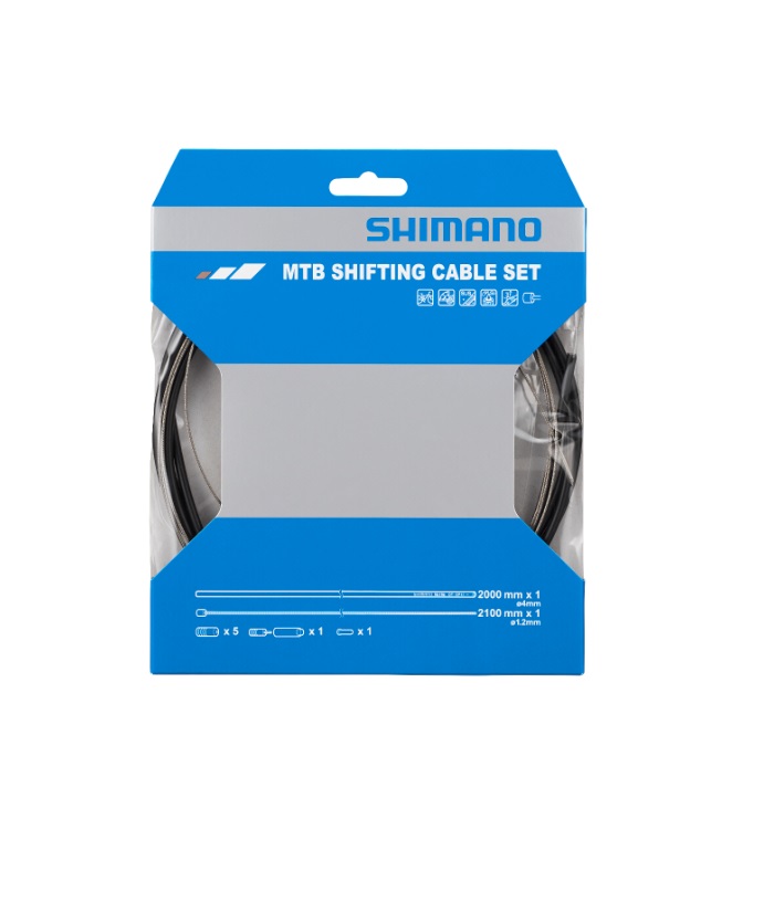 23_MTB-SHIFTING-CABLE En förpackning Shimano MTB växelvajerset SP-41. Förpackningen är blå och vit och visar vajrar och tillbehör. Belysningen är jämn och detaljerna är tydliga, vilket ger en professionell och informativ bild av produkten.