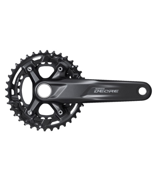 FC-M5100-2-36-26T Shimano FC-M5100 vevparti med 36/26T klingor, avsett för 2x11-växlade system. Detaljerad bild i dämpad belysning, framhäver den svarta finishen och komponenternas precision.