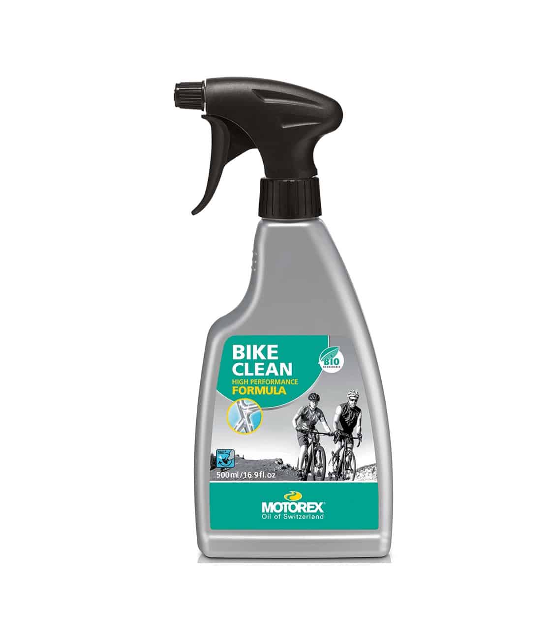 Motorex-Bikeclean.jpg En flaska Motorex Bike Clean cykelschampo med spraymunstycke, etiketten i grönt och grått visar cyklister. Studioljus framhäver produktens detaljer och form.
