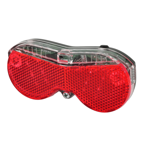 OXC Belysning bak 50mm är en röd och klar baklykta för cykel med en reflekterande yta, utformad för montering bak på cykeln för att förbättra synligheten och säkerheten.
