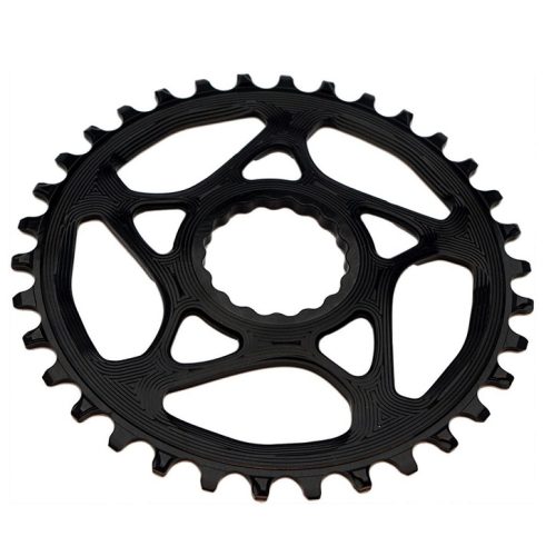 Svart AbsoluteBlack rund Boost-drev med 3 mm offset för Raceface, detaljerad textur och innovativ design syns tydligt i ljuset. Drevets unika hålmönster framhävs mot den vita bakgrunden.