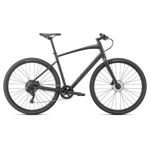 En mattsvart flatbar-cykel med tunna däck