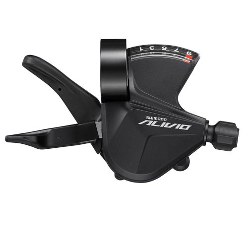Närbild av ett svart Shimano Alivio SL-M3100 växelreglage, fram eller bak, för 3x9 växlar. Detaljerad och välbelyst produktbild framhäver reglagets design och funktion.