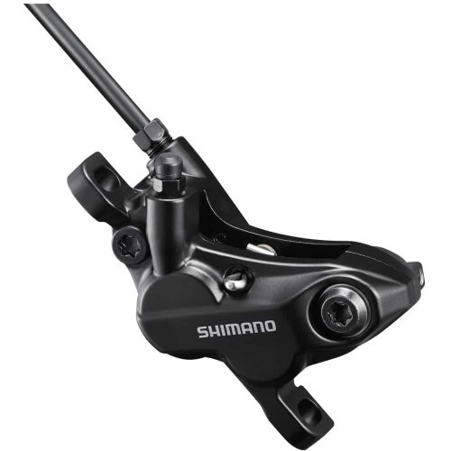 En detaljerad bild av ett svart Shimano BR-MT520 4-kolvs skivbromsok, belyst för att framhäva dess metalliska yta och skruvar. Bilden används på en sida om skivbromsok.