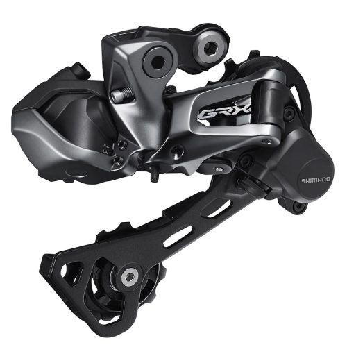 Detaljerad bild av en Shimano GRX RD-RX817 Di2 11-växlad bakväxel. Fokuserat ljus framhäver den grå och svarta mekaniska designen, med tydliga GRX- och Shimano-logotyper.