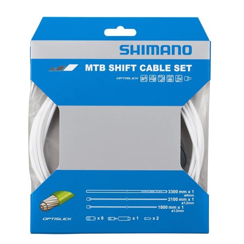 En Shimano Optislick MTB växelvajer sats för cyklar visas i en förpackning med blått och vitt tryck. Förpackningen beskriver innehållet detaljerat med illustrationer och måttangivelser