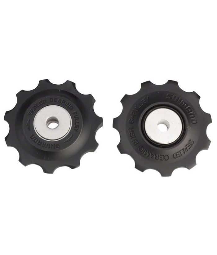 Shimano-RD-6700-Ultegra-rulltrissor.jpg Två Shimano RD-6700 Ultegra rulltrissor i svart plast med silverfärgade centrumlager