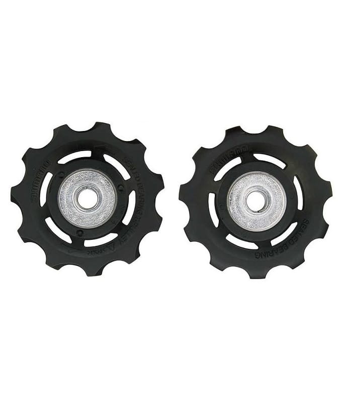Shimano-RD-6800-Ultegra-rulltrissor.jpg Två Shimano Ultegra RD-6800 rulltrissor, skarpa och detaljrika i fokus. Svarta med silverfärgade lager, presenterade mot en ren, ljus bakgrund som framhäver deras form och design.