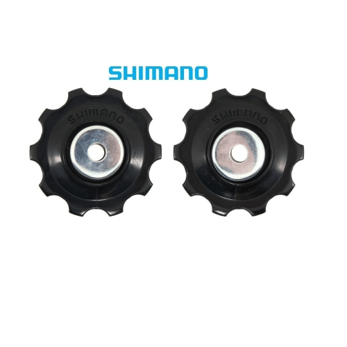 Två Shimano rulltrissor för 6/8-delad bakväxel i svart plast med silverfärgade centrum. "SHIMANO" är tryckt på ytan av rulltrissorna och ovanför i klarblått.