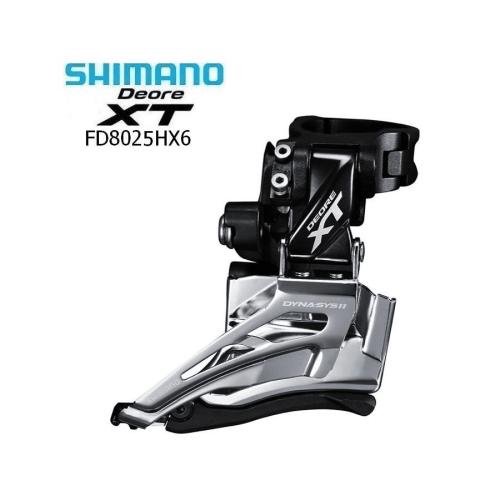 Framväxel Shimano XT FD-M8025 HX6, en blank silverfärgad cykeldel med svarta detaljer, placerad mot en vit bakgrund i ett väl upplyst foto.