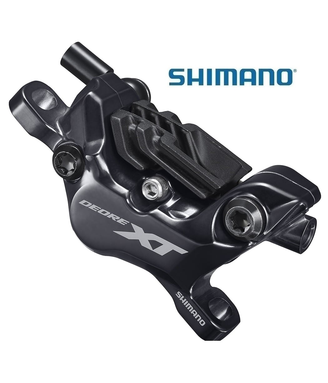 Shimano-XT-M8120-OK.jpg Detaljerad bild av ett Shimano XT Trail BR-M8120 bromsok, 4-kolvs fram/bak, i mörkgrå metall. Shimano-logotypen och "DEORE XT" är tydligt synliga mot den blanka ytan.