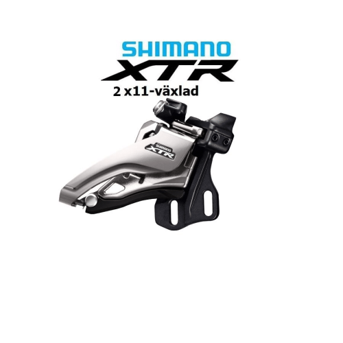 Närbild av en Shimano XTR FD-M9020 E6X framväxel för 2x11-delat system. Den silverfärgade växeln är detaljrik, med skarpa skuggor som definierar formen. Texten 'Shimano XTR' syns tydligt på komponenten.