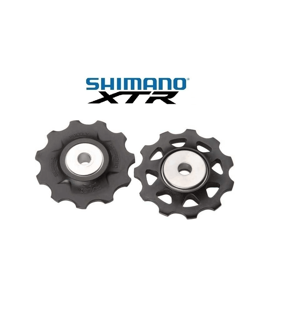 Shimano-XTR-rulltrissor-M970.png Två detaljerade Shimano RD-M970 XTR rulltrissor för 10-växlade system visas mot en ljus bakgrund under mjuk belysning, vilket framhäver deras tekniska design.