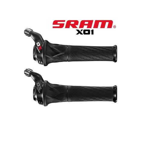 Två Sram X01 Grip Shift växelreglage, 1x11s, presenteras mot en ren vit bakgrund. Den svarta färgen framträder i det diffusa ljuset, framhävande detaljer som mönster och Sram-logotyper.