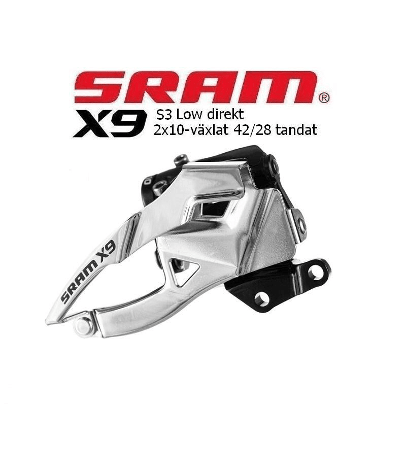 Sram-X9-2x10-2.png Närbild av en SRAM X9 S3 framväxel, låg direktmonterad, för 2x10 växlar. Silverfärgad metall och svarta detaljer framhävs av starkt ljus och skapar en skarp kontrast.