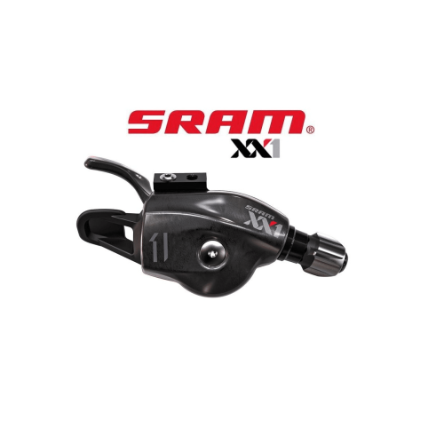 Detaljerad bild av en Sram XX1 Trigger växelreglage, 11-växlad, med fokus på dess textur och design. Mörk atmosfär med ljusreflektioner på reglagets yta.